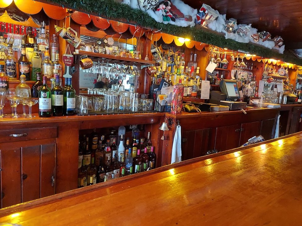 Casual restaurant interior with seating and drinks